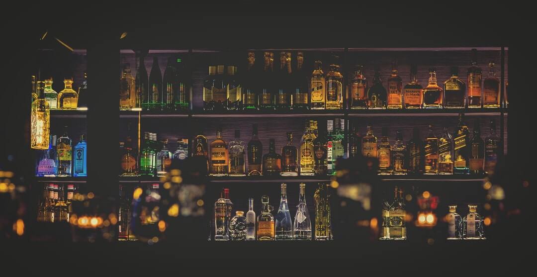 photo of a bar stacked with drinks